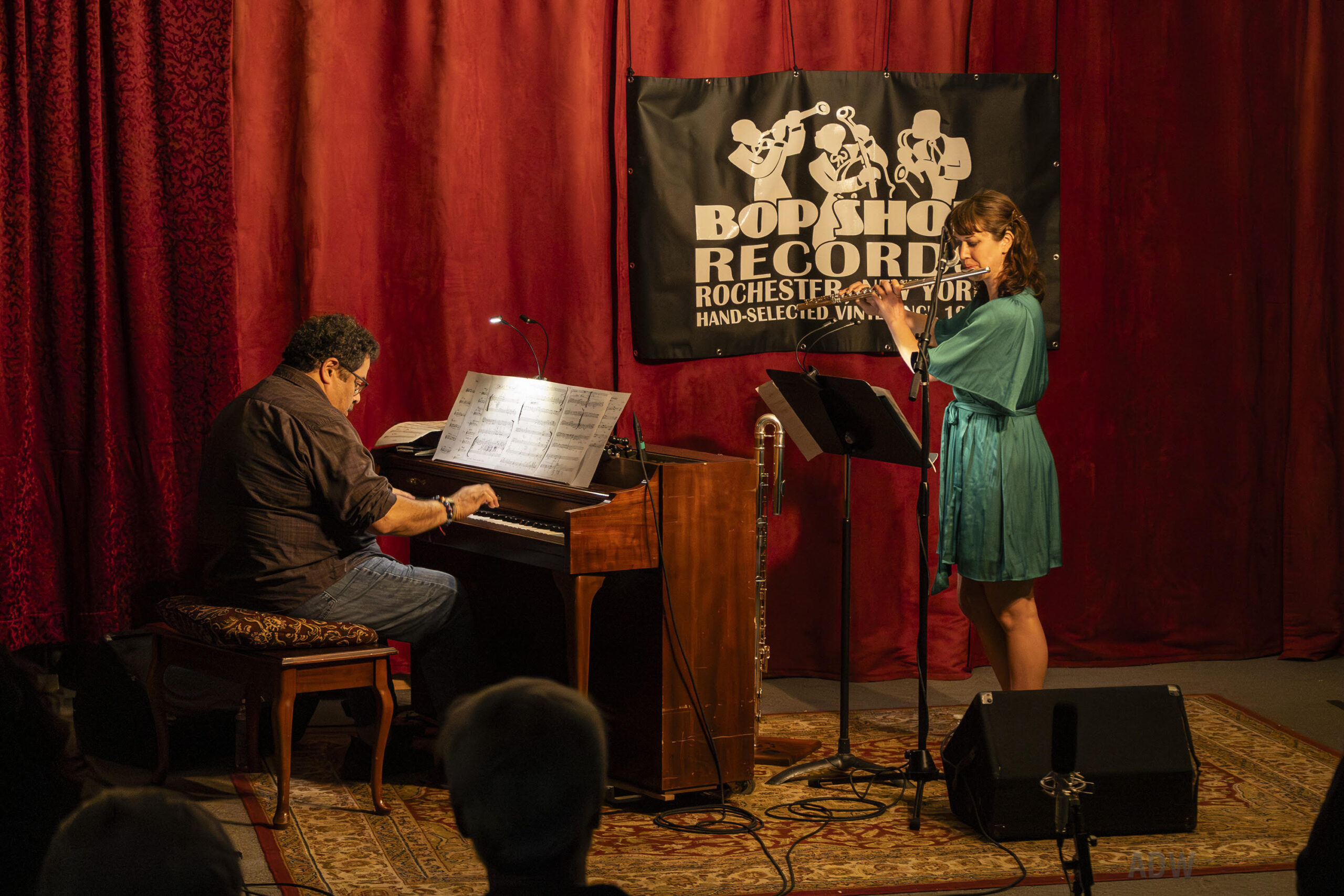 Arturo O'Farrill plays an upright piano facing flutist Elsa Nilsson.